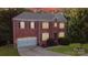 Brick two-story home with a two-car garage and landscaped yard at 5267 Norway Ln, Rock Hill, SC 29732