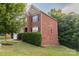 Brick home with side yard and landscaping at 5267 Norway Ln, Rock Hill, SC 29732