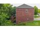 Brick house side showcasing a deck and backyard at 5267 Norway Ln, Rock Hill, SC 29732
