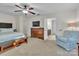 Spacious main bedroom with a king-size bed, seating area, and ensuite bathroom at 5267 Norway Ln, Rock Hill, SC 29732