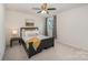 Cozy bedroom with double bed and window at 8053 Cornhill Ave, Charlotte, NC 28277