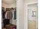 Walk-in closet with ample hanging space and shelving at 4043 Orchid Way, Tega Cay, SC 29708