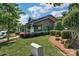 Community clubhouse with landscaping and a stone facade at 4043 Orchid Way, Tega Cay, SC 29708