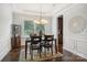 Bright dining room with hardwood floors and a chandelier at 4043 Orchid Way, Tega Cay, SC 29708