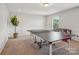 Fun game room with ping pong table and arcade game at 4043 Orchid Way, Tega Cay, SC 29708