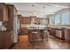 Spacious kitchen with an island and dark wood cabinetry at 4043 Orchid Way, Tega Cay, SC 29708