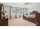 Spacious main bedroom with large bed, ceiling fan, and ample light at 4043 Orchid Way, Tega Cay, SC 29708