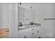 Bathroom featuring a double vanity with a granite countertop at 6217 Long Branch Rd, Salisbury, NC 28147