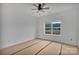 Bright bedroom featuring a ceiling fan and a window offering an outdoor view at 6217 Long Branch Rd, Salisbury, NC 28147