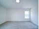 Spacious bedroom with carpet and a window at 2613 Plyler Mill Rd, Monroe, NC 28112