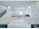 Modern kitchen with a large island and farmhouse sink at 2613 Plyler Mill Rd, Monroe, NC 28112