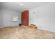 Spacious basement with tile floors and brick wall at 2909 Eastway Dr, Statesville, NC 28625