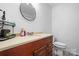 Well-appointed bathroom with vanity, toilet, and shower at 2909 Eastway Dr, Statesville, NC 28625