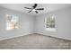 Bright bedroom with neutral walls and carpet flooring at 2909 Eastway Dr, Statesville, NC 28625