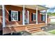 Front entrance with brick steps and porch at 2909 Eastway Dr, Statesville, NC 28625