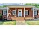 Brick front porch with columns and steps at 2909 Eastway Dr, Statesville, NC 28625