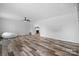 Living room with wood-look floors and fireplace at 2909 Eastway Dr, Statesville, NC 28625