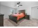 Main bedroom with ceiling fan and large bed at 2909 Eastway Dr, Statesville, NC 28625