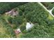 Aerial view of house, barn, and surrounding trees at 4300 Daniel Dr, Waxhaw, NC 28173