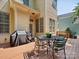 Back deck features a grill, outdoor seating, and views of the yard at 927 Dericks Xing, Fort Mill, SC 29708