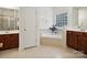 Relaxing bathroom with soaking tub, tiled floors, and dual sink vanity at 927 Dericks Xing, Fort Mill, SC 29708