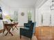 Inviting foyer showcasing gleaming hardwood floors, white trim, and elegant entryway design at 927 Dericks Xing, Fort Mill, SC 29708