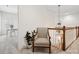 Hallway with wood banister, chair and view into office space at 927 Dericks Xing, Fort Mill, SC 29708