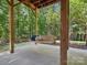 Relaxing covered porch with a wooden swing, perfect for enjoying the outdoors at 927 Dericks Xing, Fort Mill, SC 29708
