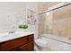 Well-lit bathroom with shower and tub combo and neutral colors and stylish fixtures at 160 Northington Woods Dr, Mooresville, NC 28117