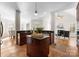 Kitchen island with granite counter, stainless appliances and tile floors at 160 Northington Woods Dr, Mooresville, NC 28117