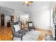 Open concept living room showing connection to kitchen and dining area, hardwood flooring at 160 Northington Woods Dr, Mooresville, NC 28117