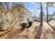 Charming home with a white picket fence surrounded by mature trees and landscaping in a desirable neighborhood at 12229 Savannah Garden Dr, Charlotte, NC 28273