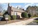 Fitness center showcasing a brick exterior, well-manicured landscaping, and clear signage for private property at 12229 Savannah Garden Dr, Charlotte, NC 28273