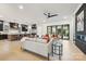 Open-concept living room showcases modern finishes, access to the backyard, and an adjacent kitchen at 626 Concord Rd, Davidson, NC 28036