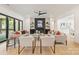 Open concept living room features a linear fireplace and views of the outside at 626 Concord Rd, Davidson, NC 28036