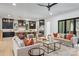 Open-concept living room and kitchen featuring modern furnishings and plenty of natural light at 626 Concord Rd, Davidson, NC 28036
