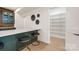 Walk-in pantry features white shelving and is conveniently located near the kitchen and dining area at 626 Concord Rd, Davidson, NC 28036