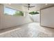 Covered patio with ceiling fan, and stone tile flooring leading to stairs at 626 Concord Rd, Davidson, NC 28036