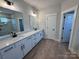 Elegant bathroom with double vanity and a walk-in shower at 5031 Mclaughlin Loop # 60, Waxhaw, NC 28173