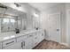 Modern bathroom with white cabinets and marble shower at 5031 Mclaughlin Loop # 60, Waxhaw, NC 28173