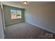 Simple bedroom with carpet and window at 5031 Mclaughlin Loop # 60, Waxhaw, NC 28173