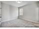 Simple bedroom with neutral walls and carpeting at 5031 Mclaughlin Loop # 60, Waxhaw, NC 28173