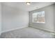 Bright bedroom featuring a large window and plush carpeting at 5031 Mclaughlin Loop # 60, Waxhaw, NC 28173