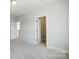 Spacious bedroom with walk-in closet and neutral carpeting at 5031 Mclaughlin Loop # 60, Waxhaw, NC 28173