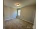 Spacious bedroom with neutral colored walls and carpet flooring at 5031 Mclaughlin Loop # 60, Waxhaw, NC 28173