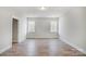 Simple bedroom with wood flooring and large windows at 5031 Mclaughlin Loop # 60, Waxhaw, NC 28173