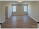 Spacious bonus room with wood floors and windows at 5031 Mclaughlin Loop # 60, Waxhaw, NC 28173