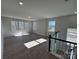 Spacious bonus room with wood floors and large windows at 5031 Mclaughlin Loop # 60, Waxhaw, NC 28173