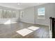 Bright bonus room featuring hardwood floors and treetop views at 5031 Mclaughlin Loop # 60, Waxhaw, NC 28173