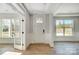 Bright entryway with hardwood floors and French doors at 5031 Mclaughlin Loop # 60, Waxhaw, NC 28173